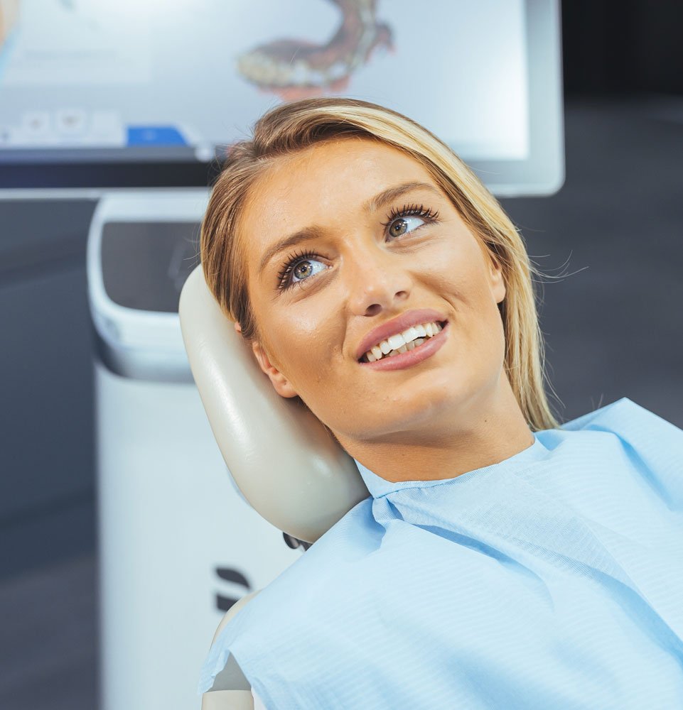 dental patient smiling in dental chair