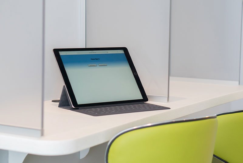 waiting area booths with ipad