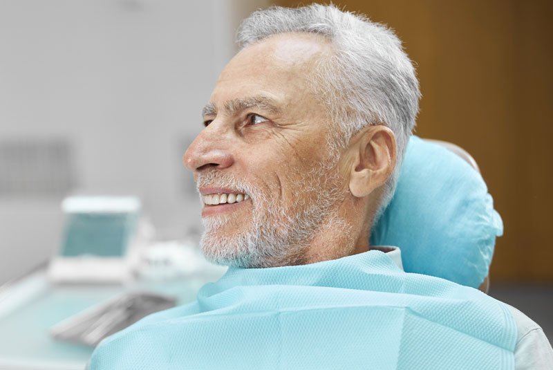 mature male during consultation for dental mplants