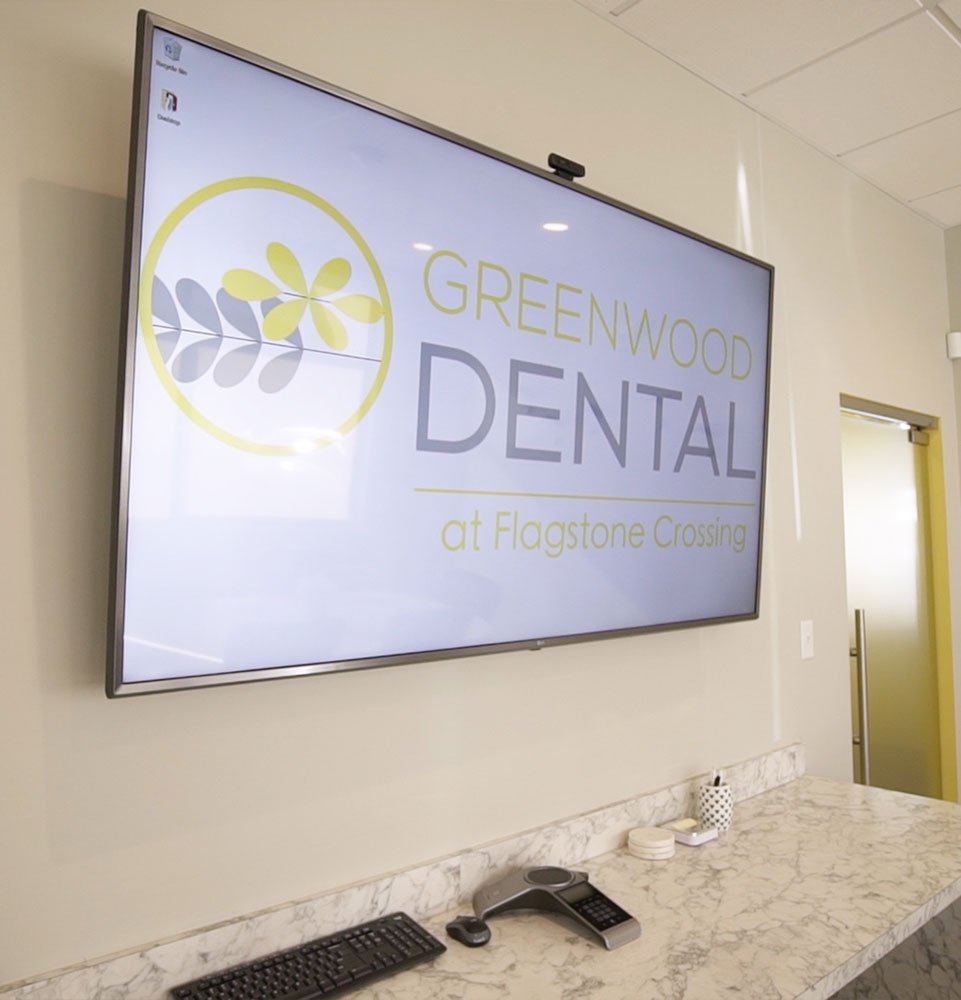 display monitor inside procedure room within the dental center