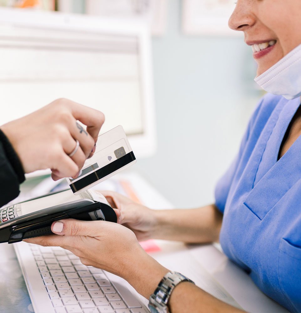 patient paying for dentalwork with creditcard