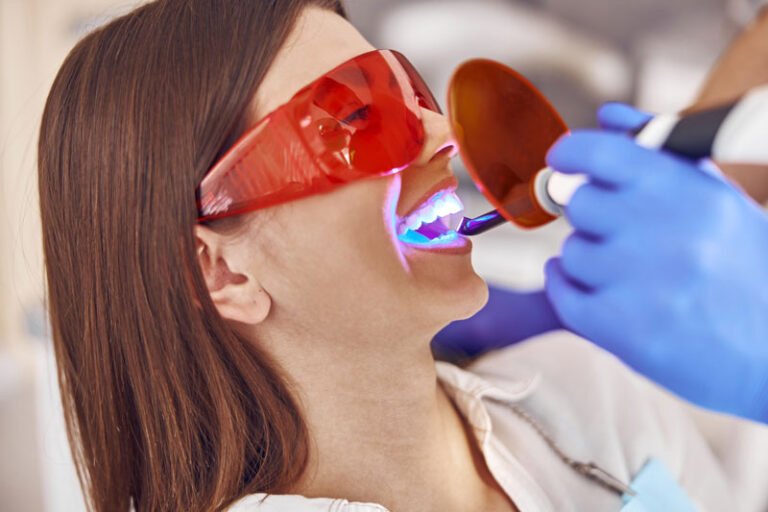 a teeth whitening procedure where the patient gets a light shone on their mouth