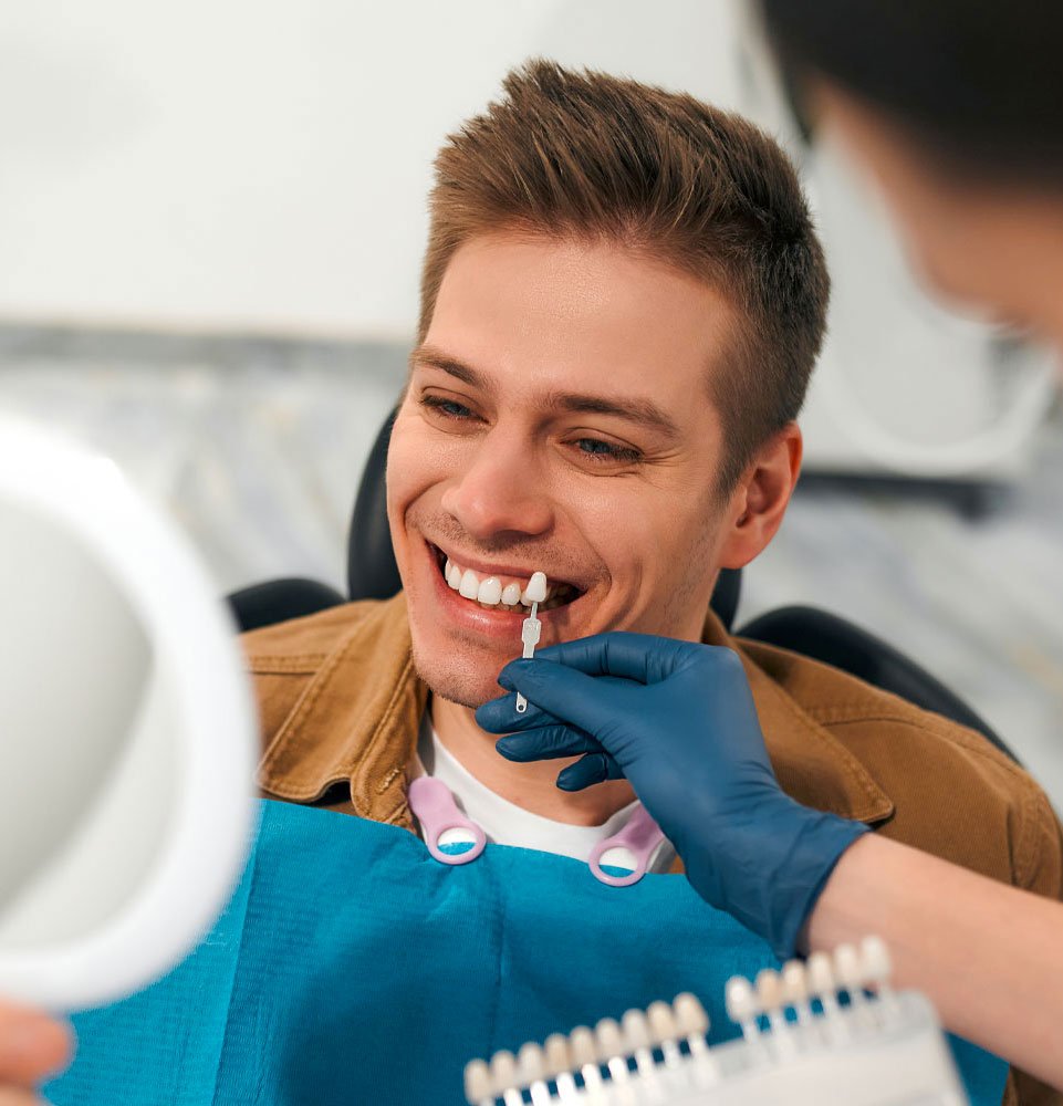 veener patient trying on lumineers with dentist