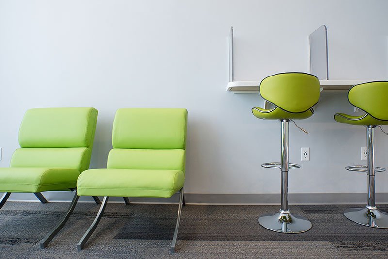 waiting area booths with ipad