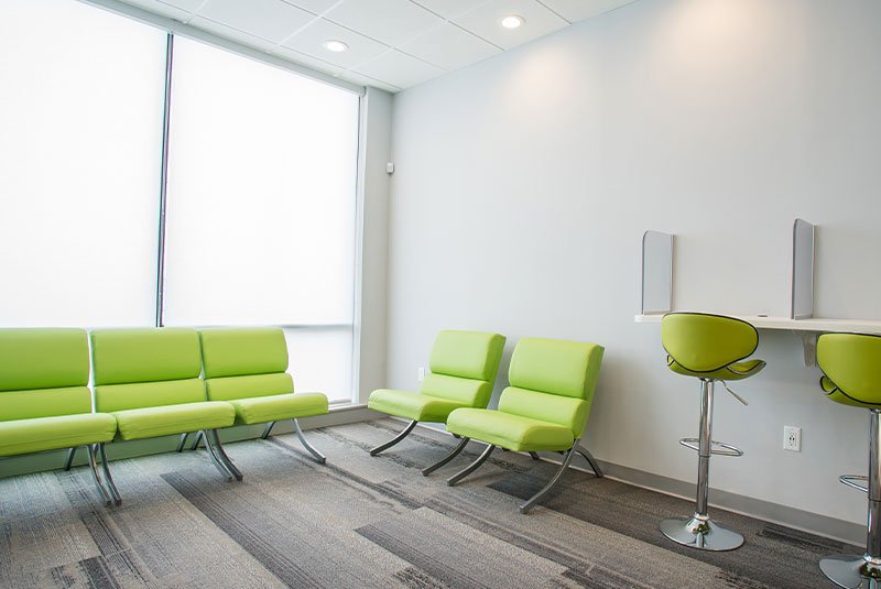 waiting area booths with ipad